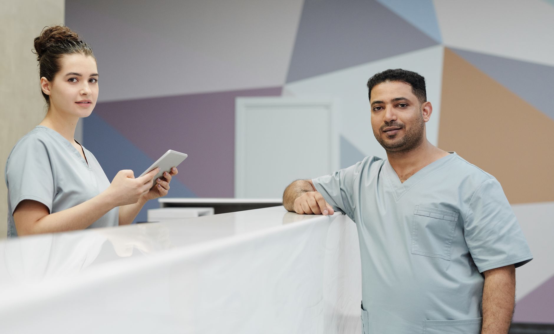 Medical staff at a modern clinic reception area
